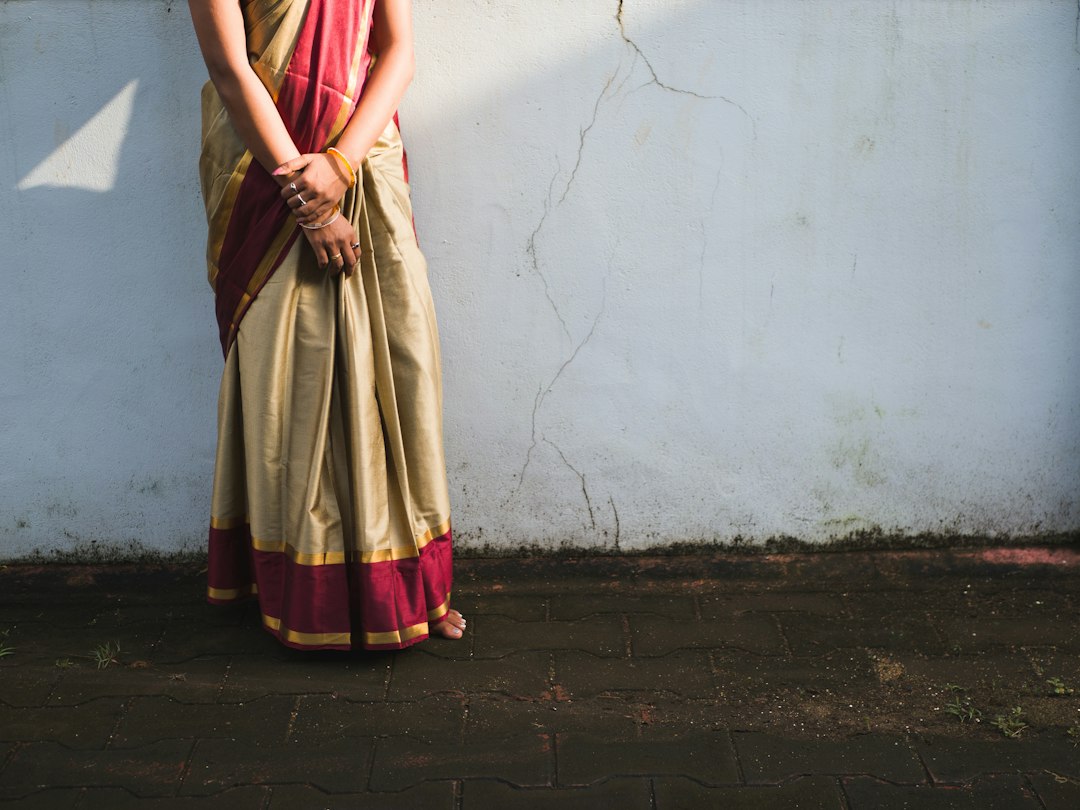 Woman in a red festive saree for Diwali celebrations